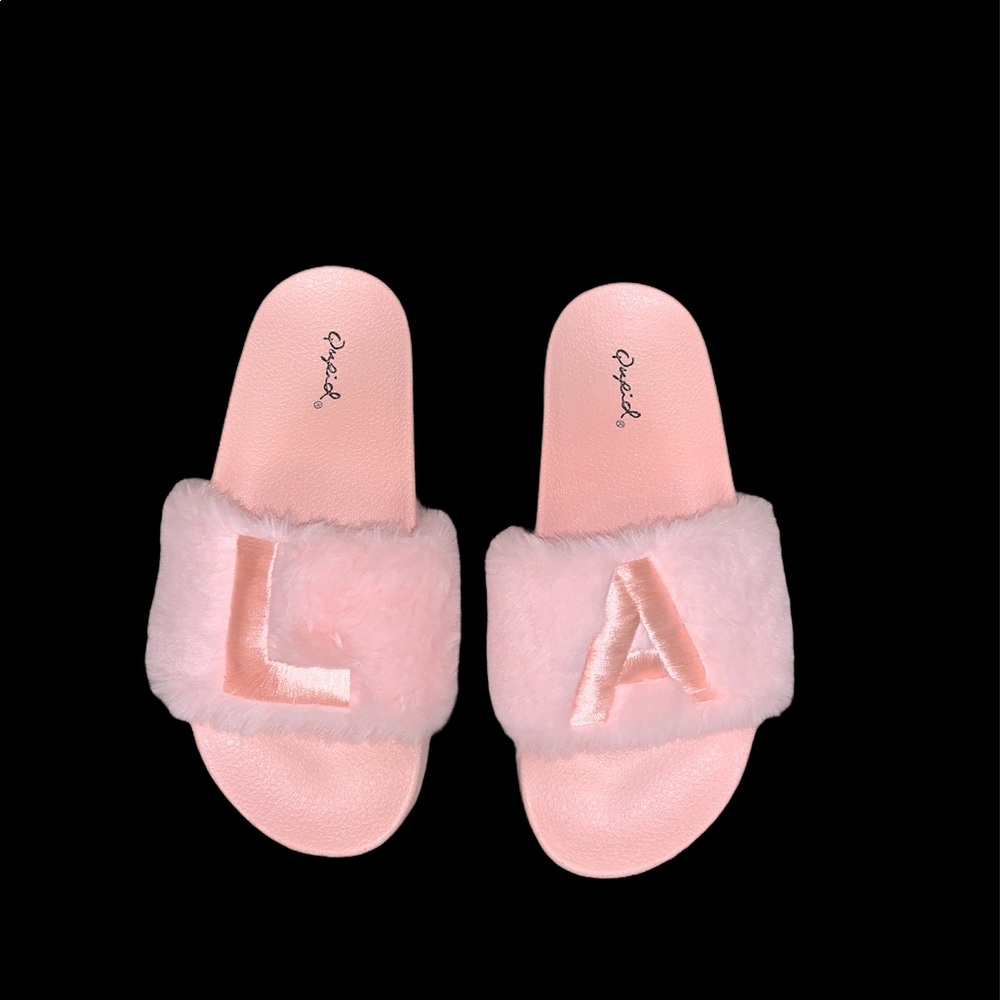 Pink furry “LA” slides